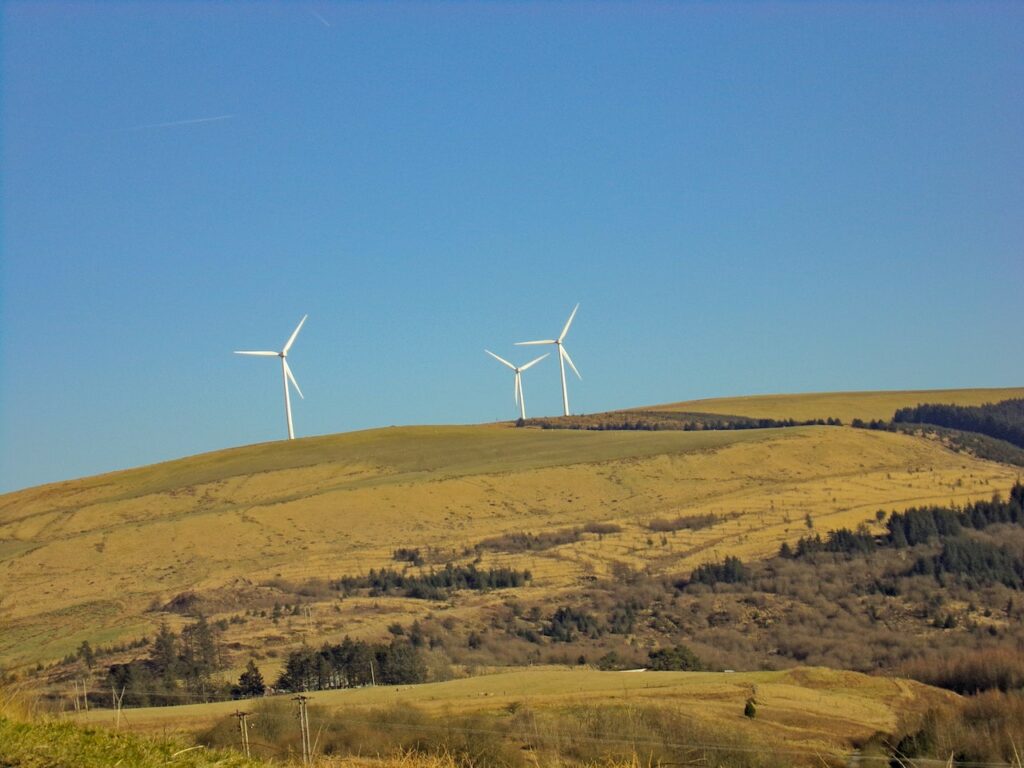 Decorative Image of Windmills on a hill